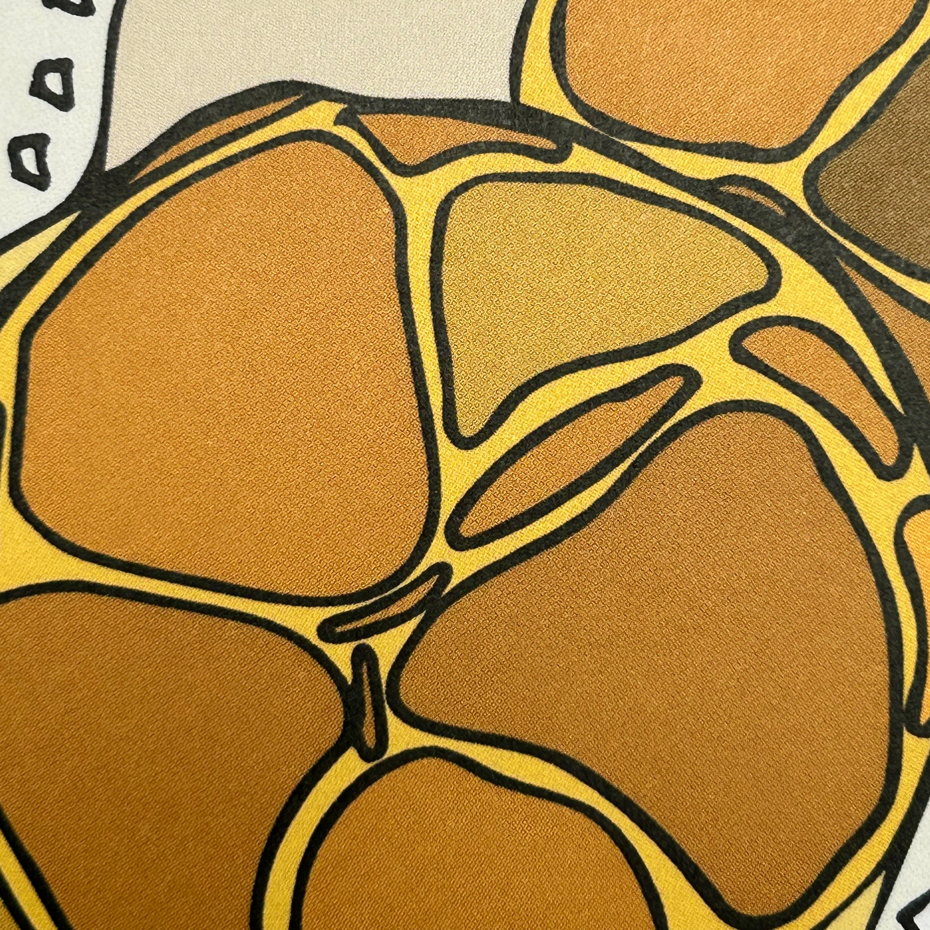 Close up detail of a colour illustration of two bolo bao on a paper doily napkin.