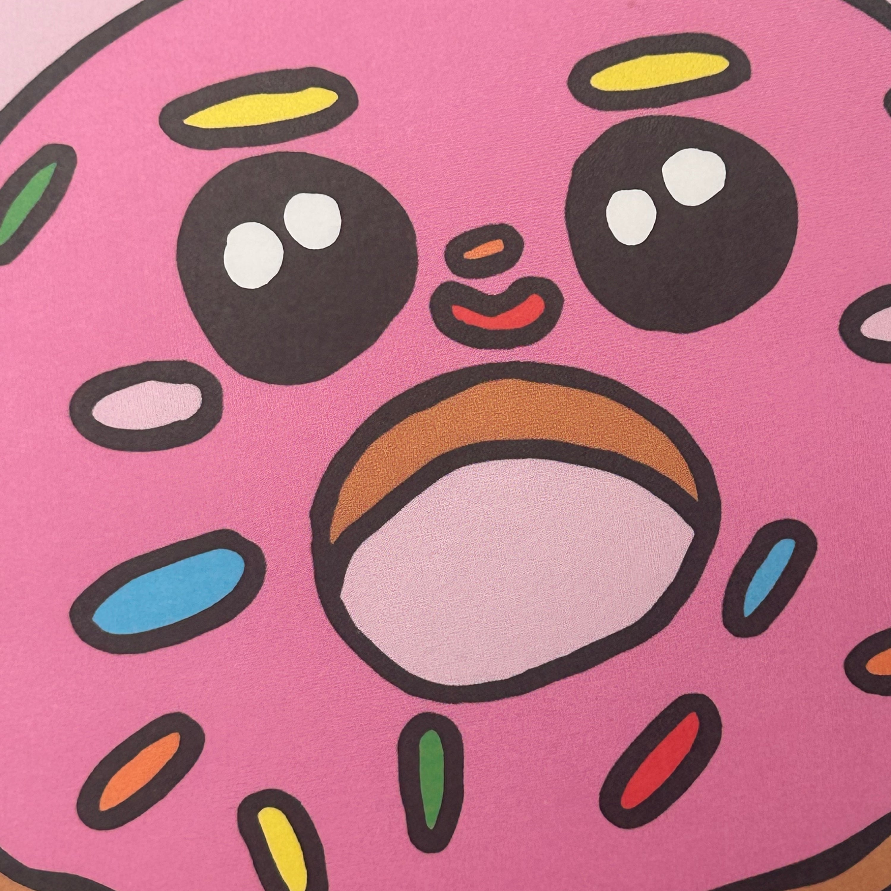 Cartoon donut with colorful sprinkles on a pink background