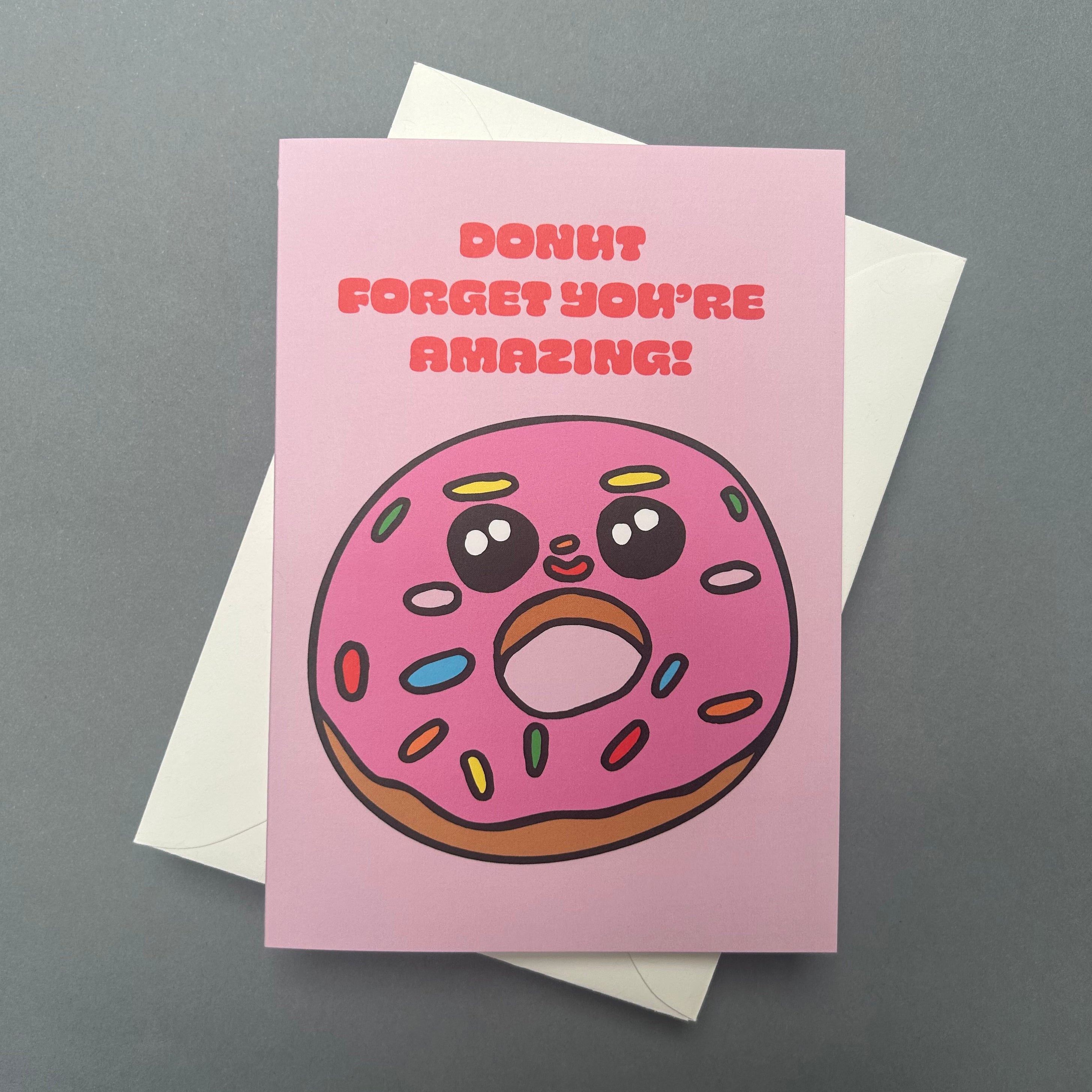 Greeting card with a donut illustration and text on a gray background