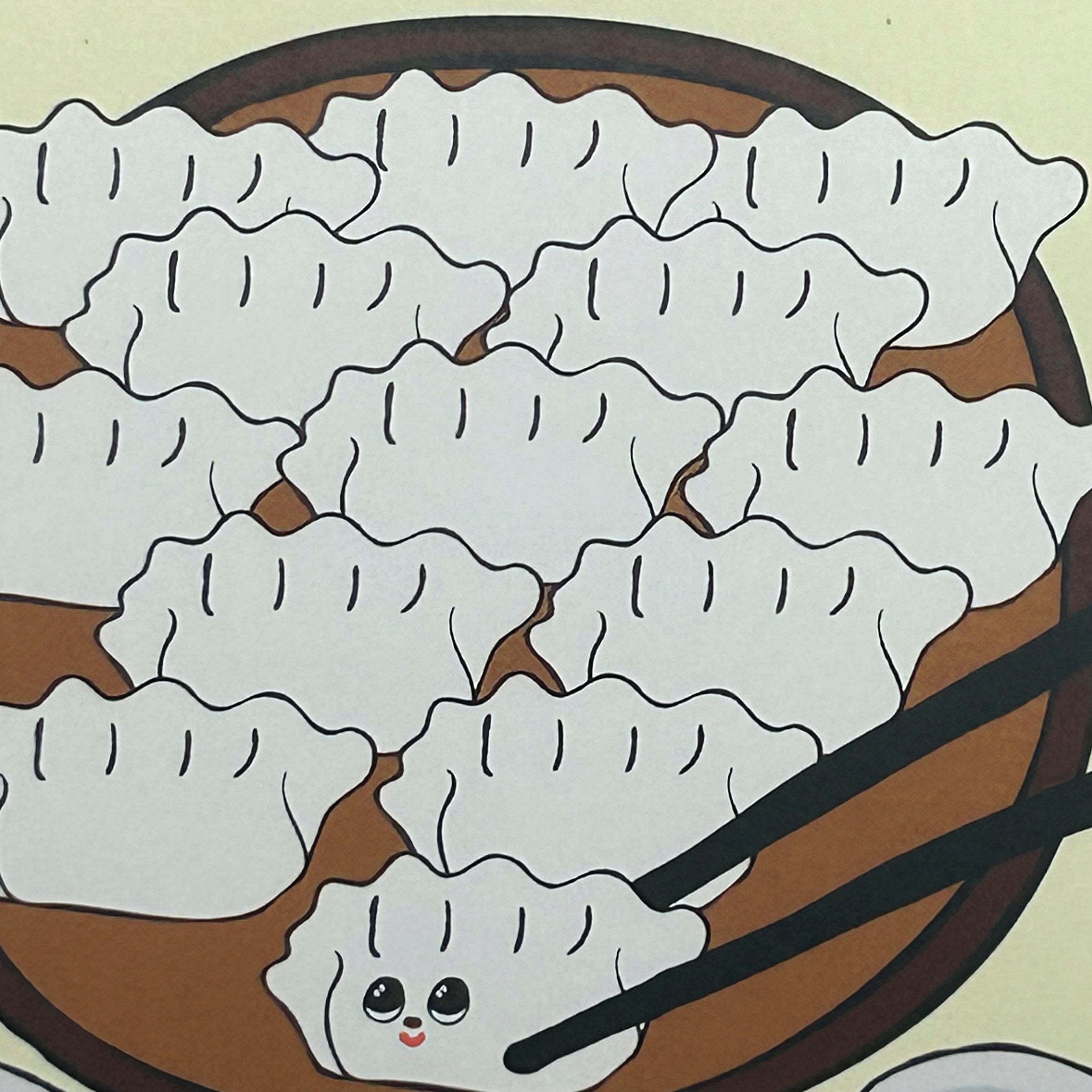 Cartoon dumplings with a smiling face on a plate with chopsticks