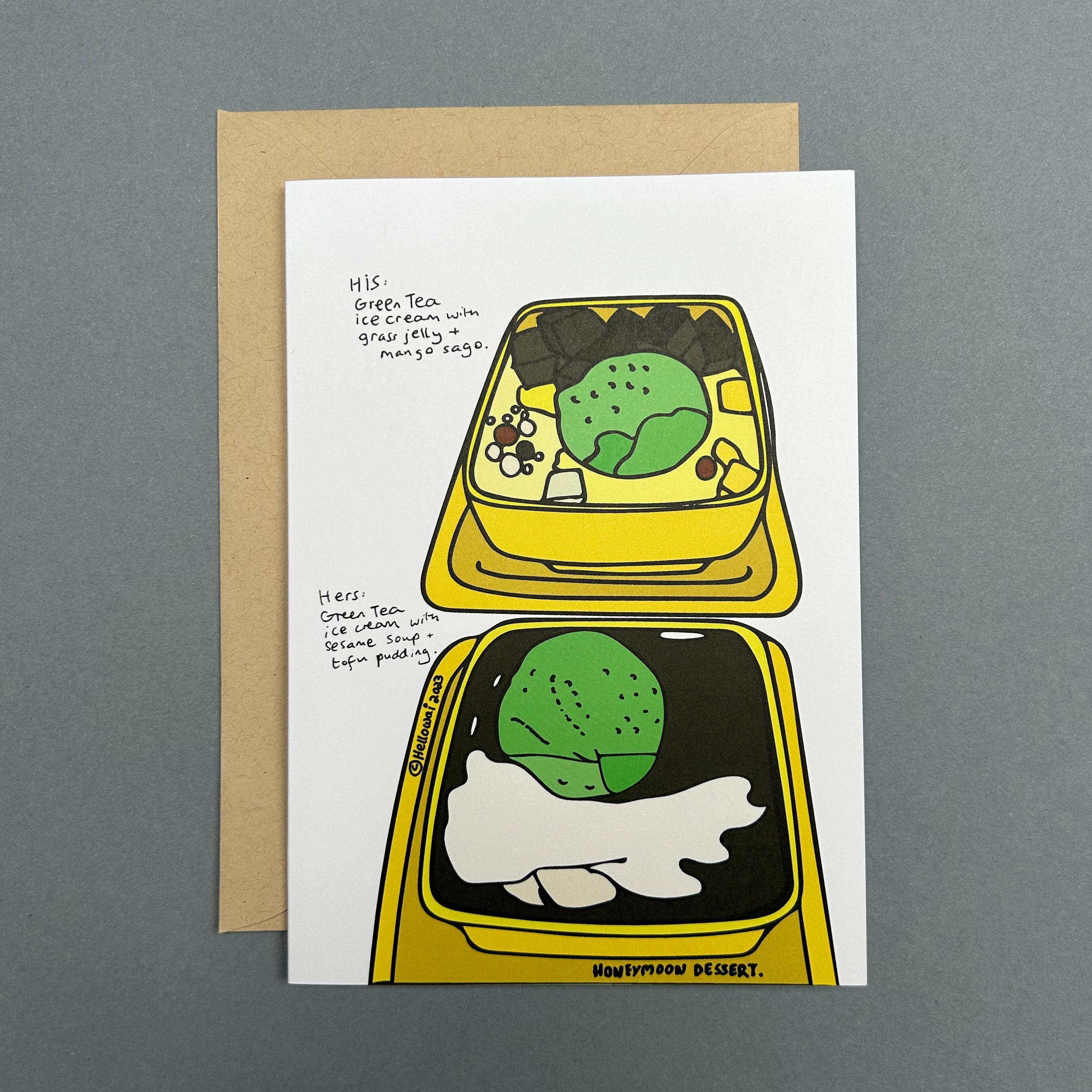 An A6 Hello Wai folded greeting card with a colour illustration of two bowls of Chinese desserts and some handwritten text describing each one of the desserts, printed on white card. The card is placed on top of a brown envelope.