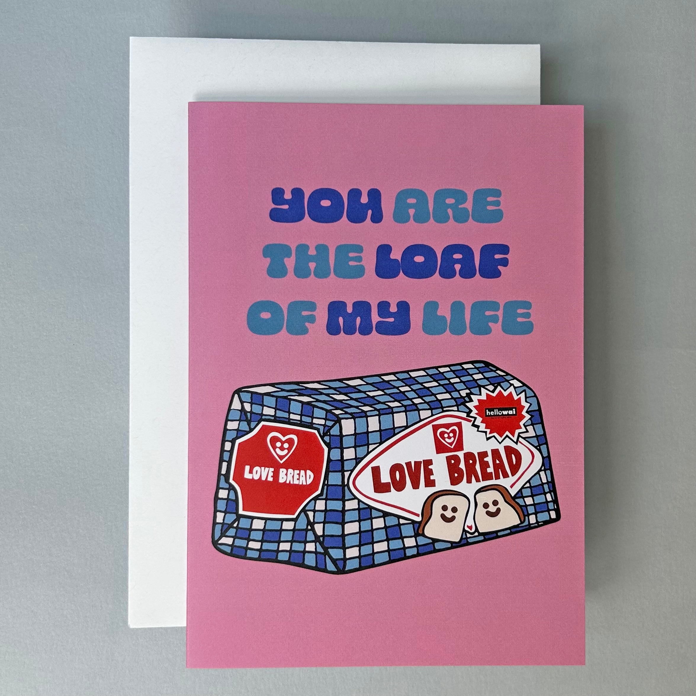 Greeting card with 'You are the loaf of my life' text and a cartoon loaf of bread on a pink background.