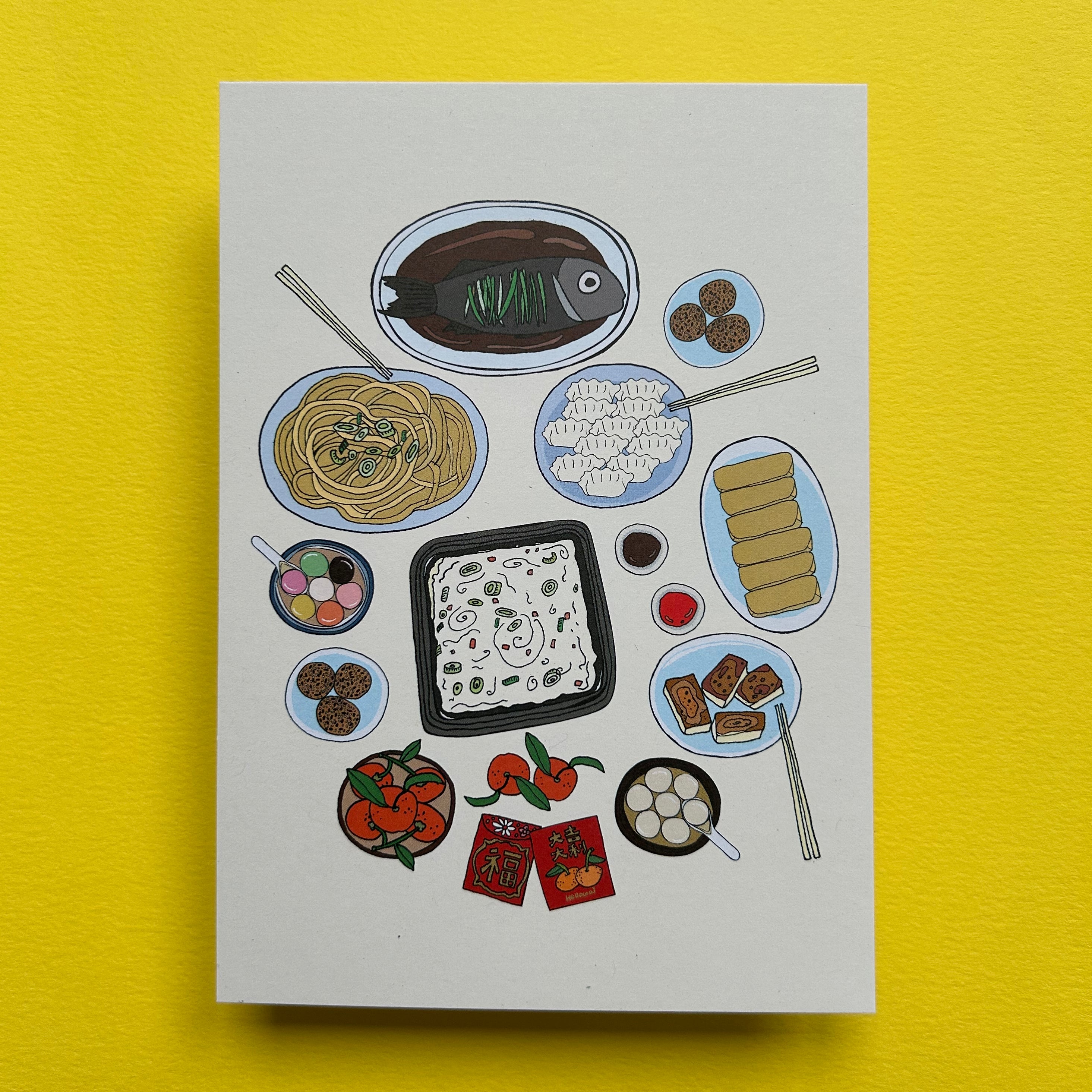 Colour illustration of a selection of different sweet and savoury Chinese dishes including a whole fish, dumplings and spring rolls and tangerines. There are chopsticks and also Chinese Lucky Red Packets, printed on a light coloured card. 