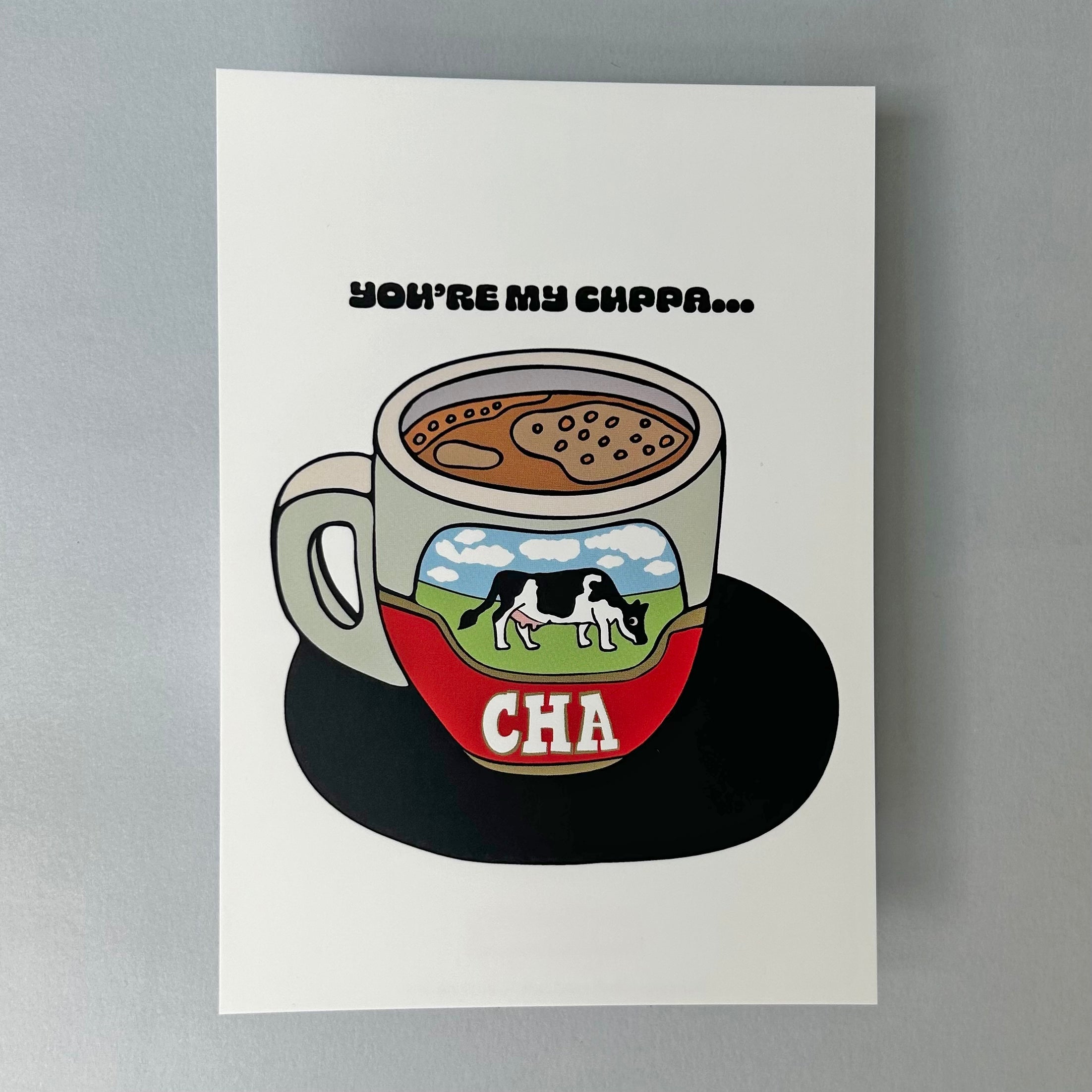A notecard with an illustration of a Hong Kong style teacup with the text 'YOU'RE MY CUPPA CHA'