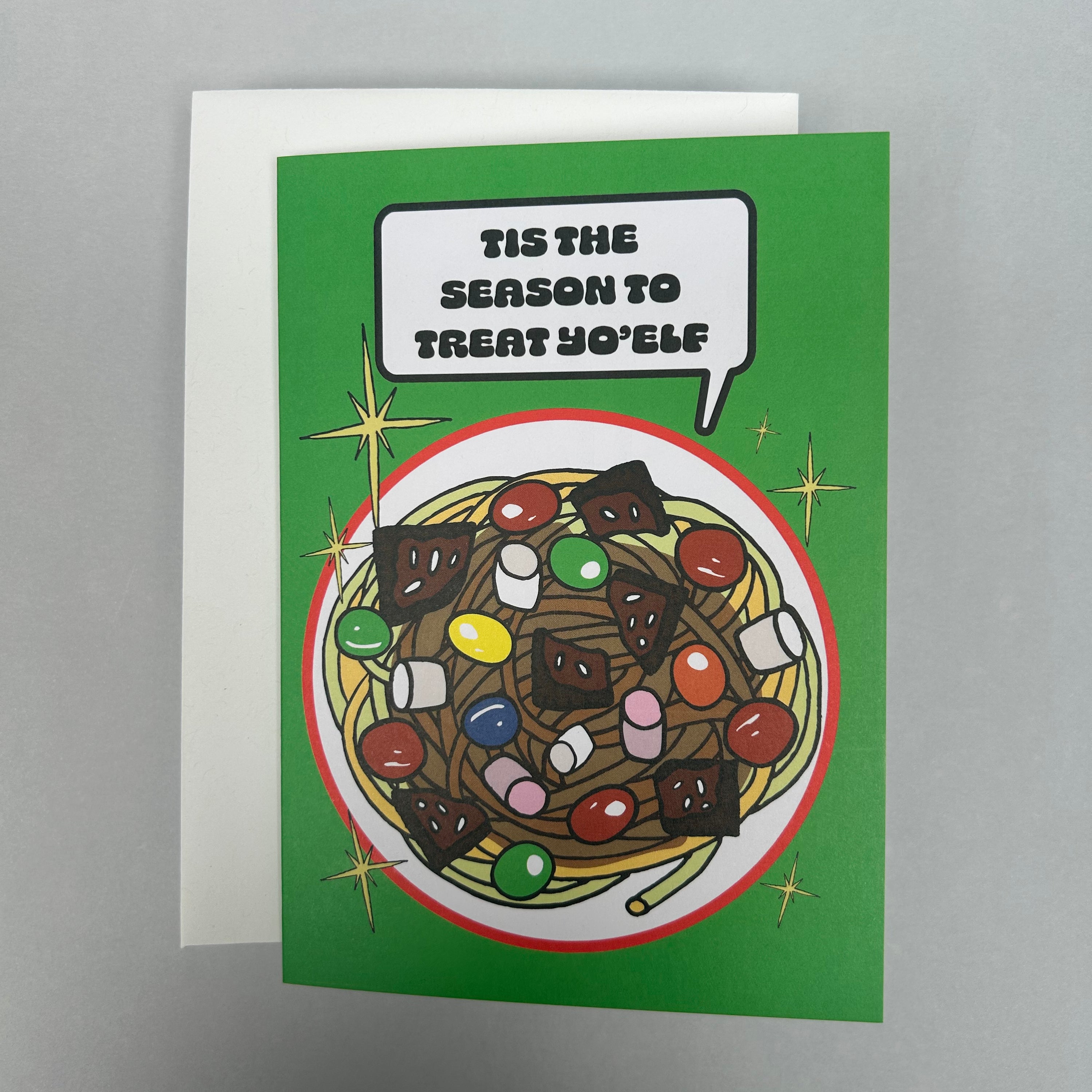 Greeting card with a colorful bowl of spaghetti and candy and text  in a speech bubble, on a green background