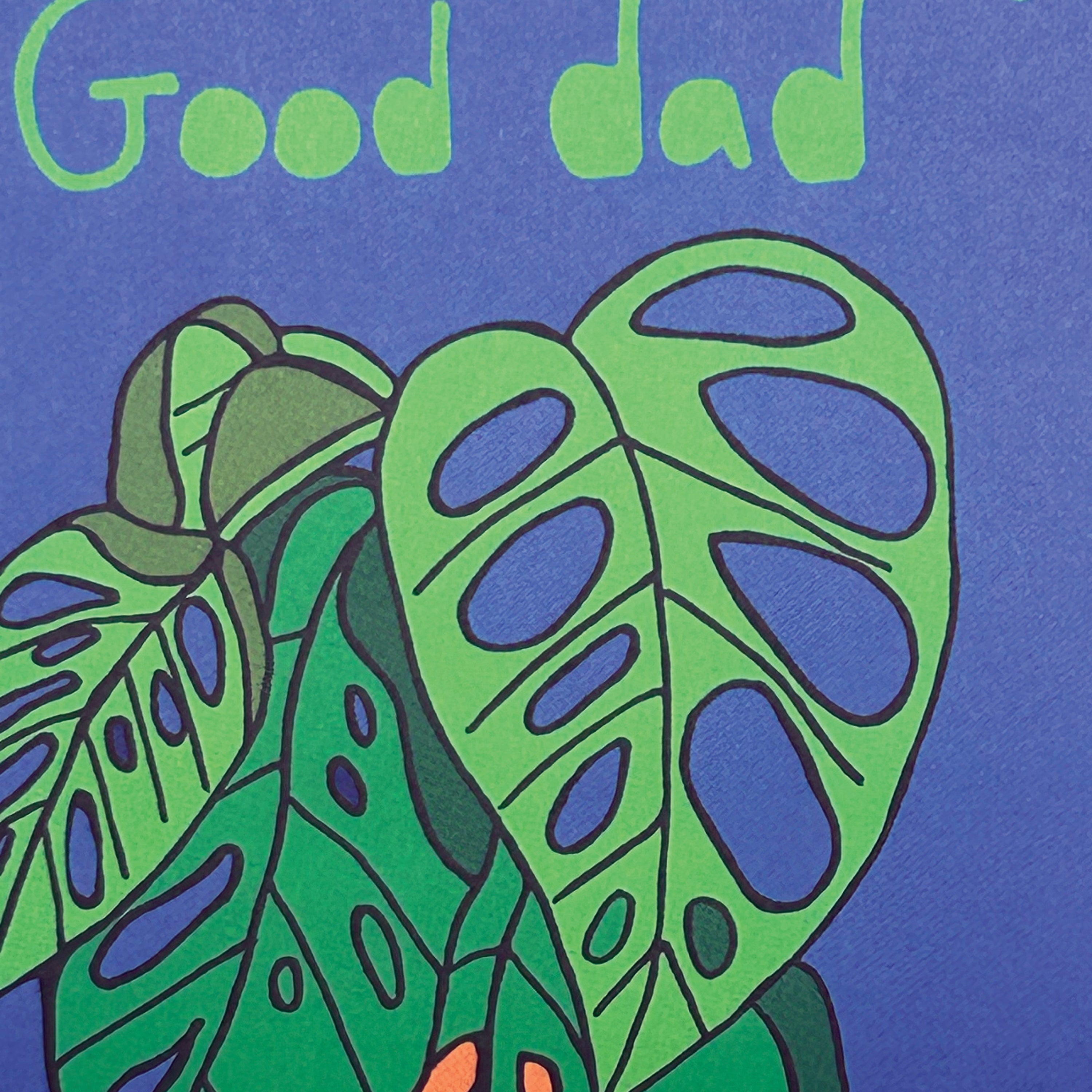 Green leaves on a blue background with 'Good dad' text